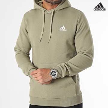 https://laboutiqueofficielle-res.cloudinary.com/image/upload/v1627638668/Desc/Watermark/adidas_performance.svg Adidas Sportswear - Sweat Capuche Feelcozy HL2274 Vert Kaki