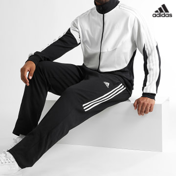 https://laboutiqueofficielle-res.cloudinary.com/image/upload/v1627638668/Desc/Watermark/adidas_performance.svg Adidas Sportswear - Ensemble De Survetement A Bandes IJ6074 Noir Blanc Gris