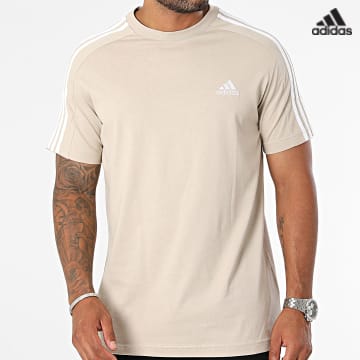 https://laboutiqueofficielle-res.cloudinary.com/image/upload/v1627638668/Desc/Watermark/adidas_performance.svg Adidas Sportswear - Tee Shirt A Bandes 3 Stripes IJ8685 Beige