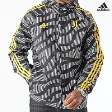 https://laboutiqueofficielle-res.cloudinary.com/image/upload/v1627638668/Desc/Watermark/adidas_performance.svg Adidas Sportswear - Coupe-Vent Zippée Capuche A Bandes Juventus HZ4963 Noir Blanc