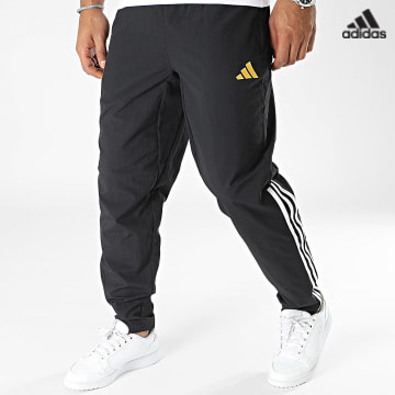 https://laboutiqueofficielle-res.cloudinary.com/image/upload/v1627638668/Desc/Watermark/adidas_performance.svg Adidas Sportswear - Pantalon Jogging A Bandes Juventus IM1871 Noir