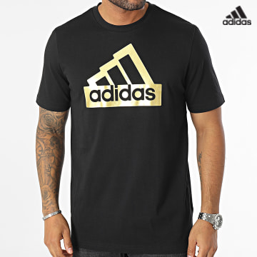 https://laboutiqueofficielle-res.cloudinary.com/image/upload/v1627638668/Desc/Watermark/adidas_performance.svg Adidas Sportswear - Tee Shirt Metallic II3468 Noir Doré