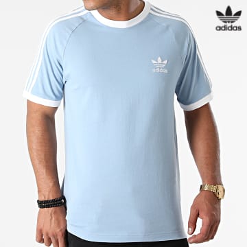 https://laboutiqueofficielle-res.cloudinary.com/image/upload/v1627646526/Desc/Watermark/3adidas_orginal.svg Adidas Originals - Tee Shirt A Bandes H37759 Bleu Clair