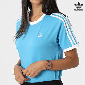 https://laboutiqueofficielle-res.cloudinary.com/image/upload/v1627646526/Desc/Watermark/3adidas_orginal.svg Adidas Originals - Tee Shirt Femme A Bandes 3 Stripes HC1963 Bleu