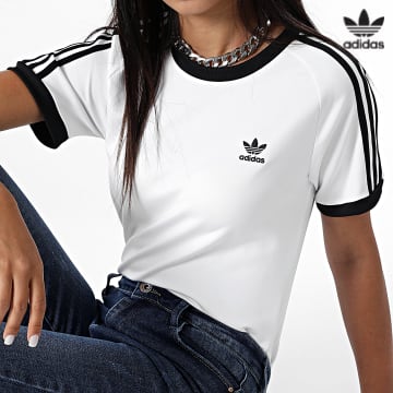https://laboutiqueofficielle-res.cloudinary.com/image/upload/v1627646526/Desc/Watermark/3adidas_orginal.svg Adidas Originals - Tee Shirt Femme A Bandes HM6412 Blanc