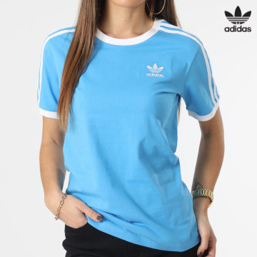 https://laboutiqueofficielle-res.cloudinary.com/image/upload/v1627646526/Desc/Watermark/3adidas_orginal.svg Adidas Originals - Tee Shirt A Bandes Femme 3 STripes HL6690 Bleu Ciel