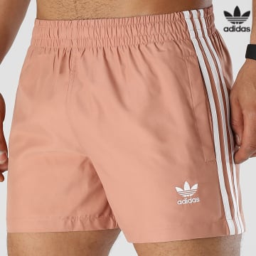 https://laboutiqueofficielle-res.cloudinary.com/image/upload/v1627646526/Desc/Watermark/3adidas_orginal.svg Adidas Originals - Short De Bain A Bandes H44771 Beige Rosé