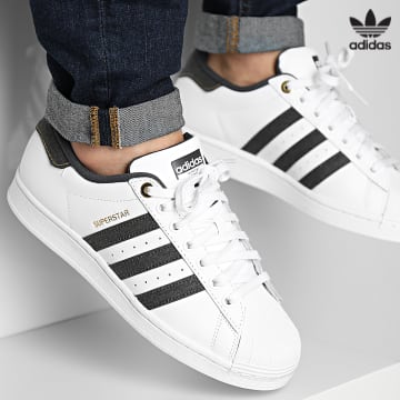 https://laboutiqueofficielle-res.cloudinary.com/image/upload/v1627646526/Desc/Watermark/3adidas_orginal.svg Adidas Originals - Baskets Superstar ID1712 Cloud White Carbon Core Black