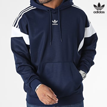 https://laboutiqueofficielle-res.cloudinary.com/image/upload/v1627646526/Desc/Watermark/3adidas_orginal.svg Adidas Originals - Sweat Capuche A Bandes Cutline IM4519 Bleu Marine