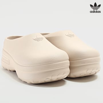 https://laboutiqueofficielle-res.cloudinary.com/image/upload/v1627646526/Desc/Watermark/3adidas_orginal.svg Adidas Originals - Mules Femme adiFOM Stan IE7052 Worn Taupe Core Black