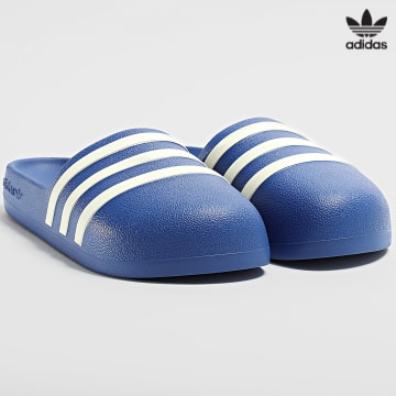 https://laboutiqueofficielle-res.cloudinary.com/image/upload/v1627646526/Desc/Watermark/3adidas_orginal.svg Adidas Originals - Mules AdiFOM Adilette IG5094 Royal Blue Off White