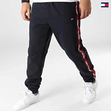 https://laboutiqueofficielle-res.cloudinary.com/image/upload/v1627647047/Desc/Watermark/5logo_tommyhilfiger_watermark.svg Tommy Sport - Pantalon Jogging A Bandes Tape 1282 Bleu Marine