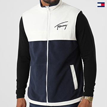 https://laboutiqueofficielle-res.cloudinary.com/image/upload/v1627647047/Desc/Watermark/5logo_tommyhilfiger_watermark.svg Tommy Jeans - Veste Zippée Sans Manches Polaire Mix Media 4093 Bleu Marine Blanc