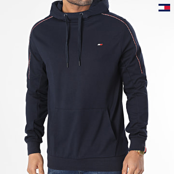 https://laboutiqueofficielle-res.cloudinary.com/image/upload/v1627647047/Desc/Watermark/5logo_tommyhilfiger_watermark.svg Tommy Sport - Sweat Capuche Piping 8950 Bleu Marine