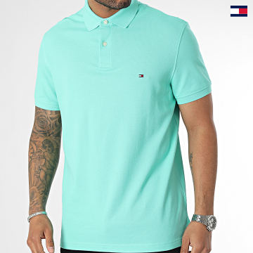 https://laboutiqueofficielle-res.cloudinary.com/image/upload/v1627647047/Desc/Watermark/5logo_tommyhilfiger_watermark.svg Tommy Hilfiger - Polo Manches Courtes Regular Polo 1985 7770 Turquoise