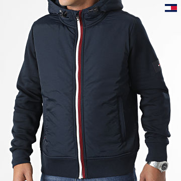 https://laboutiqueofficielle-res.cloudinary.com/image/upload/v1627647047/Desc/Watermark/5logo_tommyhilfiger_watermark.svg Tommy Hilfiger - Veste Zippée Capuche Clean Mix Media 1490 Bleu Marine