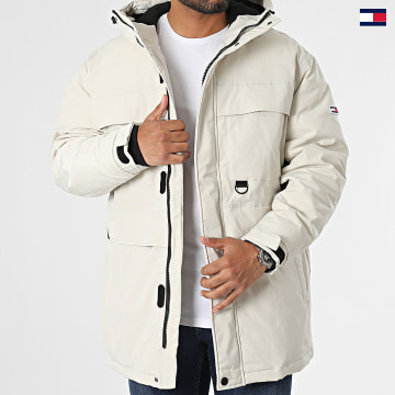 https://laboutiqueofficielle-res.cloudinary.com/image/upload/v1627647047/Desc/Watermark/5logo_tommyhilfiger_watermark.svg Tommy Jeans - Parka Capuche Tech Parka 7227 Beige