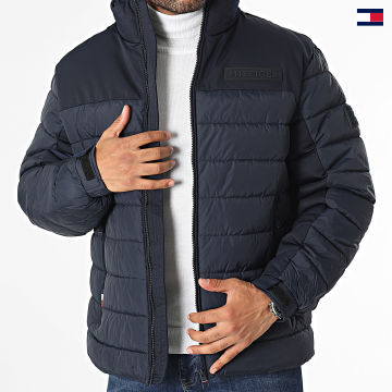 https://laboutiqueofficielle-res.cloudinary.com/image/upload/v1627647047/Desc/Watermark/5logo_tommyhilfiger_watermark.svg Tommy Hilfiger - Doudoune New York 4263 Bleu Marine