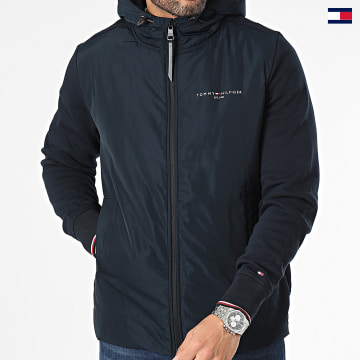 https://laboutiqueofficielle-res.cloudinary.com/image/upload/v1627647047/Desc/Watermark/5logo_tommyhilfiger_watermark.svg Tommy Hilfiger - Veste Zippée Capuche Mix Media 4253 Bleu Marine