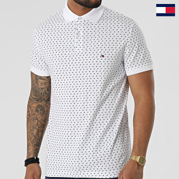 https://laboutiqueofficielle-res.cloudinary.com/image/upload/v1627647047/Desc/Watermark/7logo_tommy_hilfiger.svg Tommy Hilfiger - Polo A Manches Courtes Micro Print 6831 Blanc