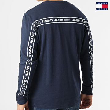 https://laboutiqueofficielle-res.cloudinary.com/image/upload/v1627651009/Desc/Watermark/3logo_tommy_jeans.svg Tommy Jeans - Tee Shirt Manches Longues Tape 2792 Bleu Marine