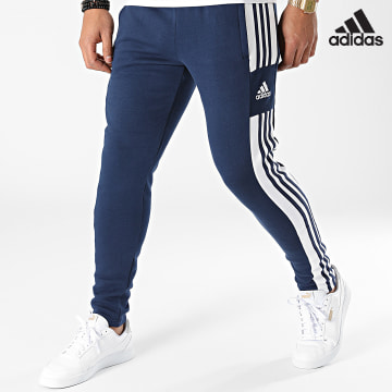 Adidas Sportswear - GT6644 Pantaloni da jogging a bande blu navy