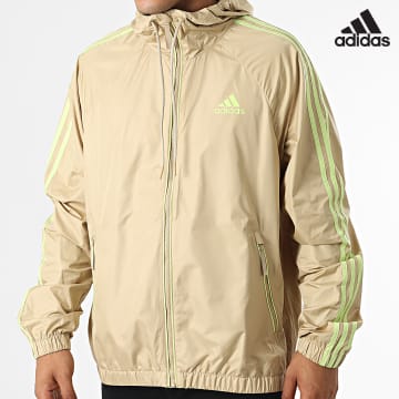 Adidas Sportswear - Giacca a vento con cappuccio 3 Stripes H65775 Beige
