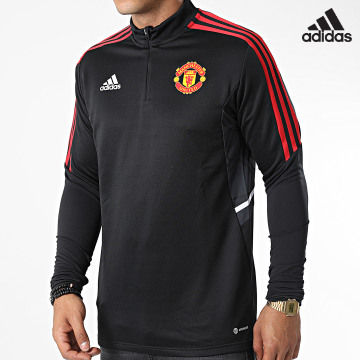 Adidas Sportswear - Manchester United H64013 Maglietta nera a maniche lunghe con strisce