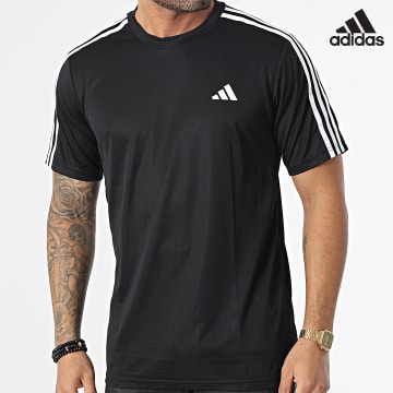 Adidas Sportswear - Maglietta con strisce Train Essentials Base 3 Stripes IB8150 Nero