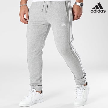 Adidas Performance - IC0052 Pantalón de chándal de 3 rayas gris jaspeado