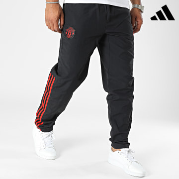 Adidas Sportswear - Pantalon Jogging A Bandes Manchester United IA7296 Noir