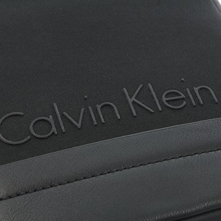 Calvin Klein - Sacoche Caillou Mini Flat Crossover Noir