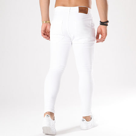 Jean slim blanc troué femme 2025