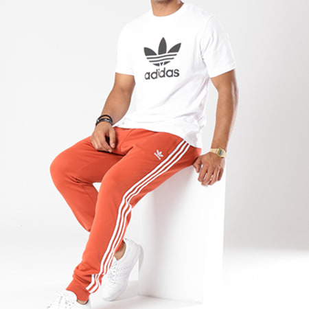 Adidas Originals - Pantalon Jogging Avec Bandes SST DH5836 Orange Brique
