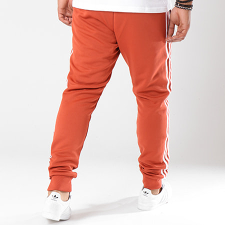 Adidas Originals - Pantalon Jogging Avec Bandes SST DH5836 Orange Brique