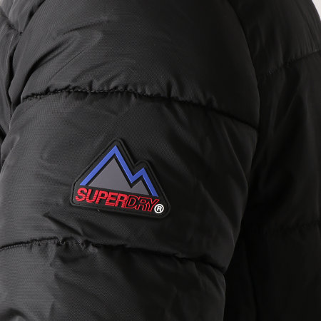 Superdry - Doudoune Sports Puffer M50006CR Noir Bleu Roi