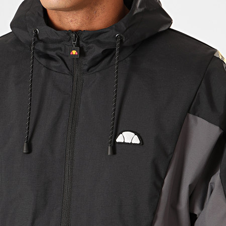 Ellesse Coupe Vent Manno Noir Gris Anthracite Avec Bandes Reflechissantes LaBoutiqueOfficielle