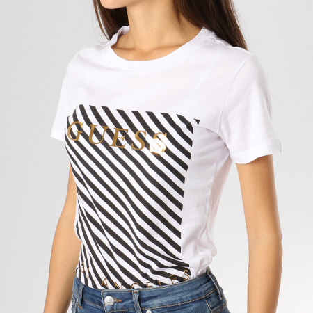 Guess - Tee Shirt Femme W91I72K7WS0 Blanc Noir Doré