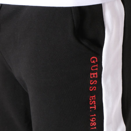 Guess - Pantalon Jogging Avec Bandes M91B09-K81V0 Noir Blanc