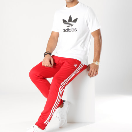 Adidas Originals - Pantalon Jogging A Bandes SST DV1534 Rouge