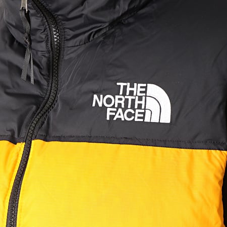 The North Face - Doudoune Sans Manches 1996 Nuptse Retro 3JQQ Orange Noir