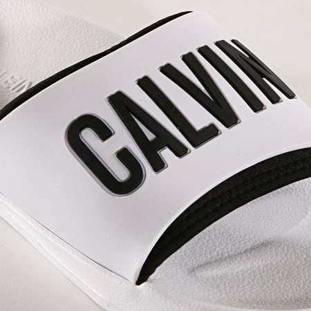 Calvin Klein - Claquettes Slide 376 Blanc Noir