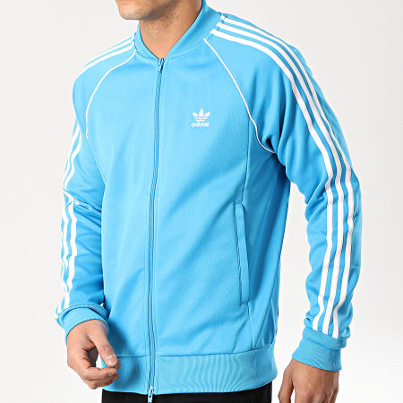 Adidas Originals - Veste Zippée Avec Bandes SST DZ4636 Bleu Clair Blanc -  LaBoutiqueOfficielle.com