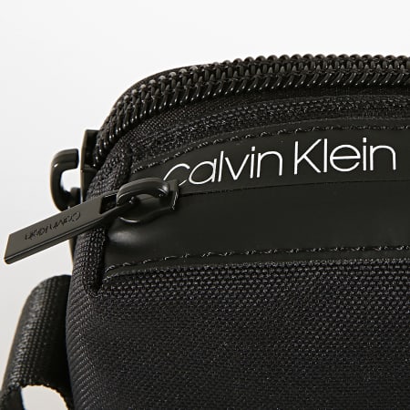 Calvin Klein - Sacoche Split Mini Reporter 4617 Noir
