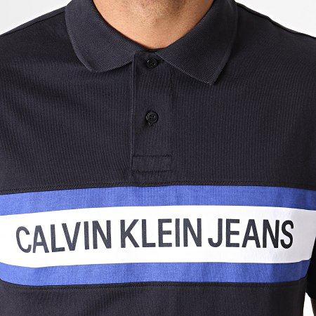 Calvin Klein - Polo Manches Courtes Chest Stripe Logo 2540 Noir Blanc Bleu