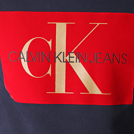 Calvin Klein - Sweat Crewneck Flock Monogram 3567 Bleu Marine Rouge