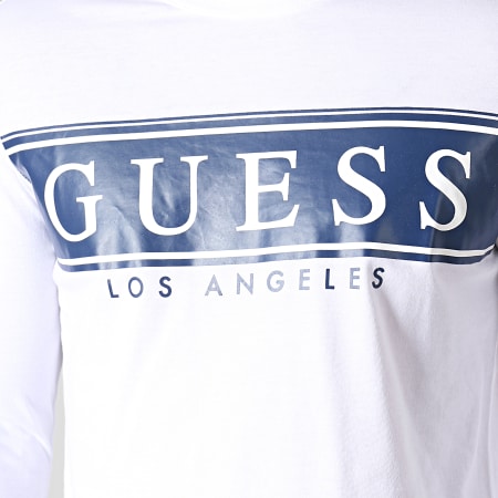 Guess - Tee Shirt Slim Manches Longues M93I50K8HM0 Blanc Bleu Marine