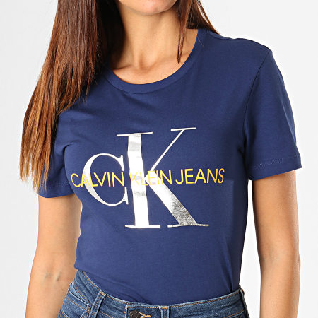 Calvin Klein - Tee Shirt Femme Metallic Monogram 1508 Bleu Marine Argenté Orange