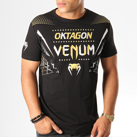 Venum - Tee Shirt Oktagon 03872 Noir Doré Argenté