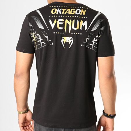 Venum - Tee Shirt Oktagon 03872 Noir Doré Argenté